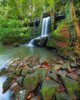 Waterfall at the historic Niezelgrund hydroelectric power station, Lohmen, Saxony, Germany