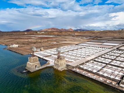 Salt mining plant, Salinas de Janubio with green Laguna de Janubio, near Yaiza, aerial view,
