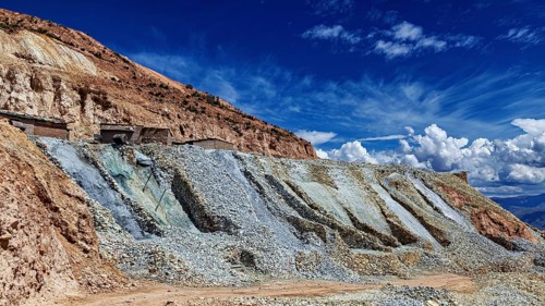 Wide quarry landscape with rocks and a blue, cloudy sky, The silver mines of Potosi on Cerro Rico
