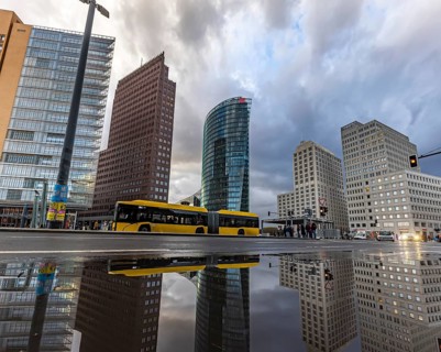Potsdamer Platz Berlin in the evening with traffic on the streets. When it rains, the skyscrapers