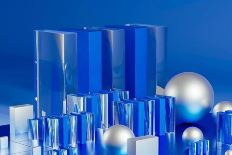 An array of geometric forms cast in blue illuminates a stunning 3D technological environment,