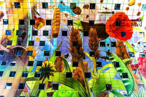 Markthal from 2014, offers over 100 food stalls and delicatessens with spectacular ceiling fresco