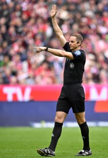 Referee Sören Stork's gesture gesture soccer Bundesliga, Allianz Arena, Munich, Bavaria, Germany