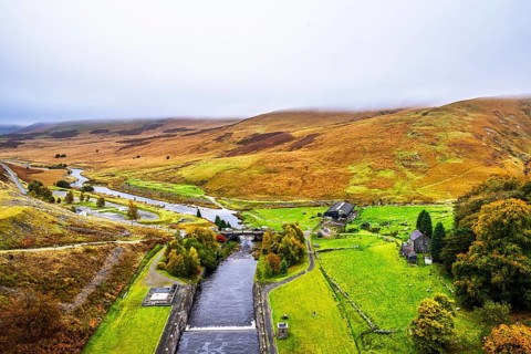 Autumn colors over Claerwen Dam, Claerwen Valley, Elan Valley Reservoir, Rhayader, Powys, Wales, UK