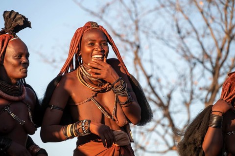 Himba woman dancing euphorically, traditional dance, traditional Himba village, Kaokoveld, Kunene,