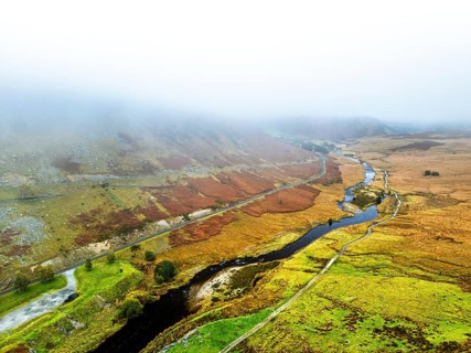 Autumn over Claerwen Dam, Claerwen Valley, Elan Valley Reservoir, Rhayader, Powys, Wales, UK