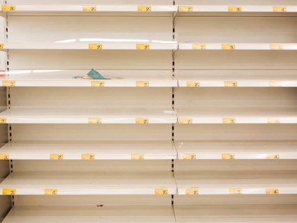 Empty shelves in the store due to panic caused by coronavirus - prices in Polish currency (PLN)
