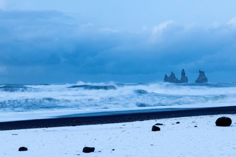Reynisdrangar pinnacles, lava sandy beach, waves sea, snow, winter, Vik, Iceland, Scandinavia