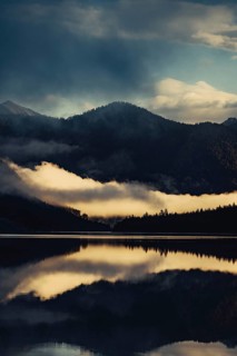 Sunrise with reflections in the Plansee in Tyrol in the Alps in Austria
