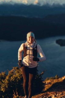 Trail running in autumn on the Jochberg on Lake Walchensee against the wonderful backdrop of the