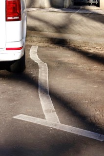 Parking line displaced by heat in summer, Germany