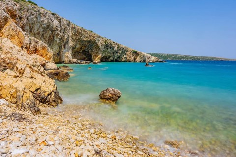 Romantic view over the sea in Koromacna Bay on a sunny day with rough seas on the island of Cres,