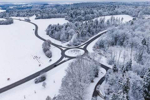 Roundabout in snowy landscape, seen from the air, Gechingen, Calw district, Germany