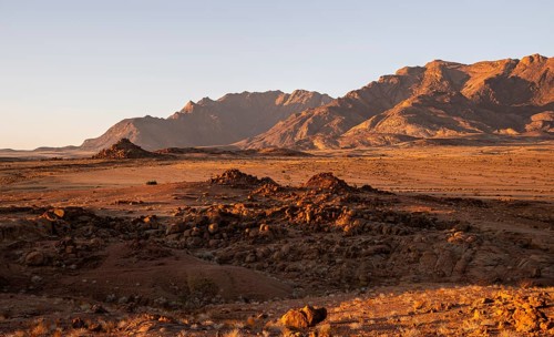 Desert landscape with Brandberg in morning light, at sunrise, Erongo, Damaraland, Namibia