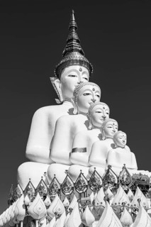 Five-headed Buddha statue, black and white photo, Wat Phra That Sorn Kaew Buddhist temple complex,