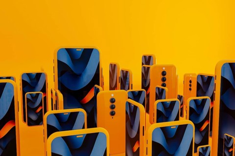 Many yellow frame smartphone exist with blue abstract art displayed on the screen. This creates a
