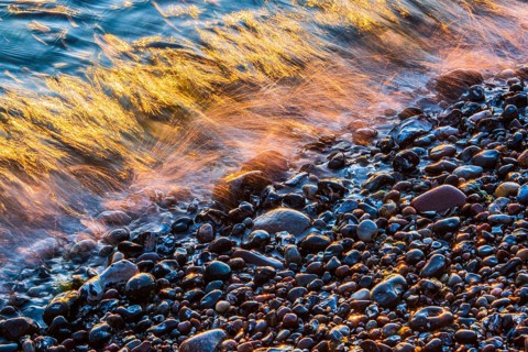 Wave play at sunrise on the chalk coast in Jasmund National Park, Rügen, Sassnitz,