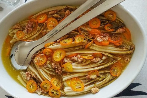 Vegetarian cuisine, chicory, salad, winter vegetables, kumquats (Fortunella), dwarf oranges, sliced