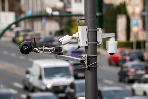 Flir and Vivotek video cameras at a large, busy traffic light intersection, Alfredstraße, B224 and