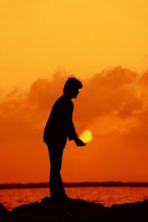 Woman at sunset on the coast, Camargue, Provence, South of France