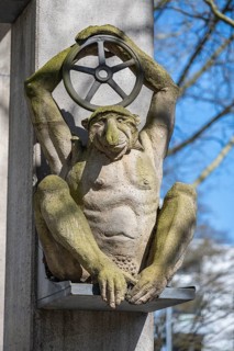 Sculpture by sculptor Peter Lenk at the Arc de Triomphe on the Lower Arbor depicts an ape-like