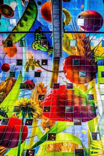 Markthal from 2014, offers over 100 food stalls and delicatessens with spectacular ceiling fresco
