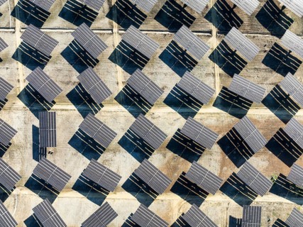 Rows of solar panels at a photovoltaic plant near Vejer de la Frontera. Aerial view. Drone shot.