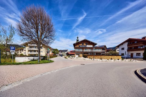 Alpine buildings, road, curve, church tower, parking lot, Alpenliebe Design Hotel, bare winter