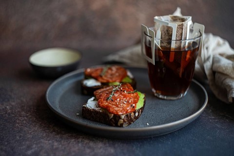 A visually appealing arrangement of whole wheat bread topped with savory pepperoni slices, served