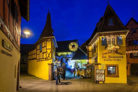 Houses illuminated and decorated for Christmas, Christmas market, blue hour, Eguisheim, Haut-Rhin