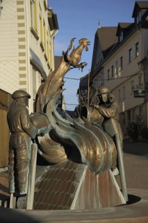 Fire fountain by Boniface Stirnberg 2010 in memory of historic city fire in 1886, modern art,