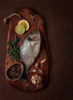 Fresh, raw dorado fish, top view, no people