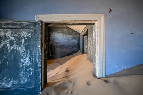 Former dwelling house full of sand, Kolmanskop, restricted diamond area, Karas region, Namibia
