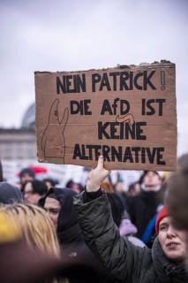 150, 000 people gather around the Bundestag in Berlin to build a human wall against the shift to