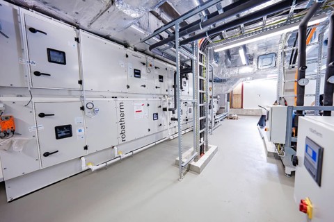 Well-organized technical room with ventilation installations and industrial equipment, ventilation