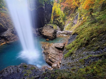 Waterfall mountain list in autumn-colored surroundings, Linthal, Klausenpass, Canton of Glarus,