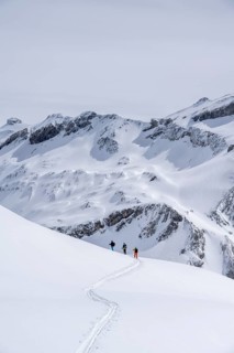Three lonely ski tourers, winter in the Bernese Alps, Bernese Oberland, Switzerland