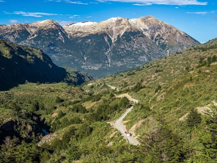 Road Carretera Austral south of Cochrane, mountain pass, driving bus, Patagonia, Chile