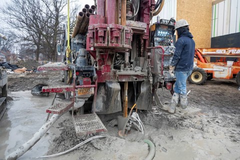 Detroit, Michigan - Workers for Crabtree Drilling drill a series of 500-foot deep wells for a