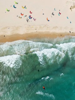 Kite surfers at the Los Lances beach near Tarifa. Aerial view. Drone shot. Cádiz province,