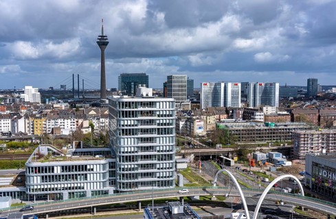 Skyline of buildings in downtown Düsseldorf, Rheinturm, Rheinbrücken, road bridge on Völklinger