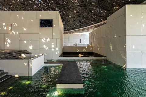 Interior design in Louvre Abu Dhabi, art museum by French architect Jean Nouvel, buildings on