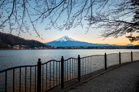 Kawaguchi Lake waterfront, view of Mount Fuji volcano at sunset, Yamanashi Prefecture, Japan