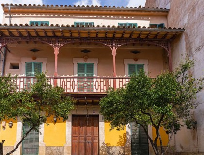 Urban architecture and house facades in the picturesque mountain village of Valdemossa, Majorca,