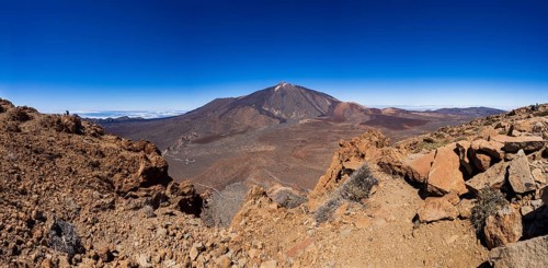 Mountain hiking, view from the summit of Montana Guajara to Mount Teide, Teide National Park,