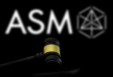 Court gavel in front of the ASM logo. ASM International N.V is a Dutch headquartered multinational