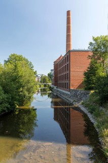 Former company building of the Theodor Haase dye works on the Chemnitz river, industrial