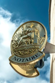 Notary office sign. France