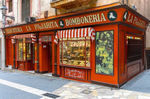 Bomboneria, decorative façade of small retailers in the old town of Palma de Majorca, Spain