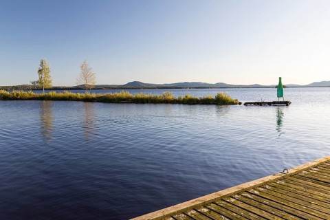 On Lake Siljan near Nusnäs, mountains in the background, Dalarnas län, Sweden